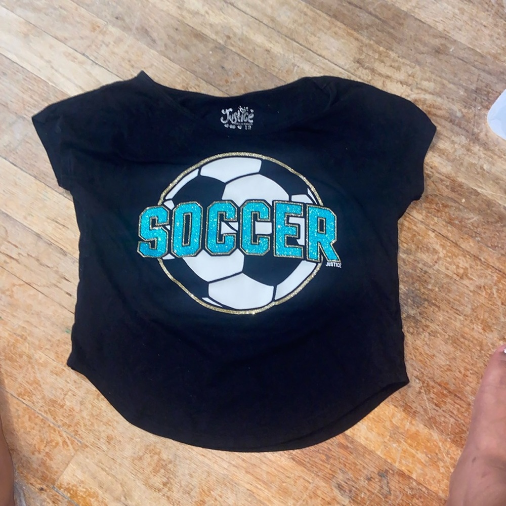 From Justice. Size 12. Black shirt with turquoise lettering